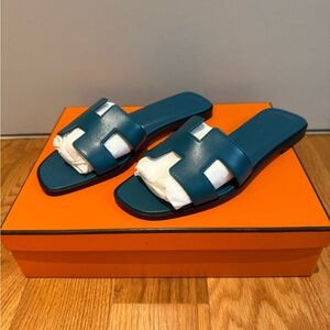 New in Box Hermes Orans Dark Teal Slides in 36.5